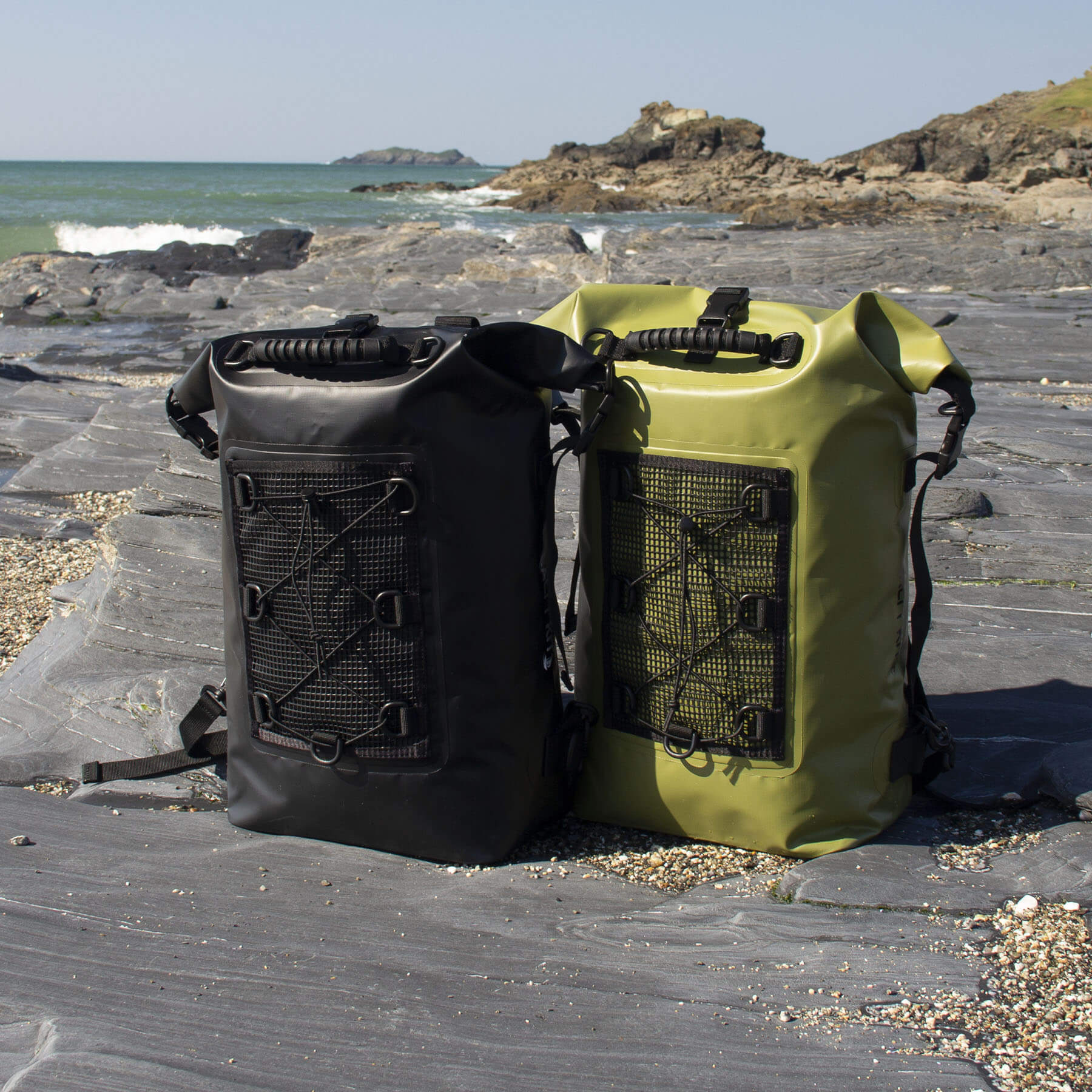 the black and olive 30 litre salty kit backpack photo taken on trevone rocky beach