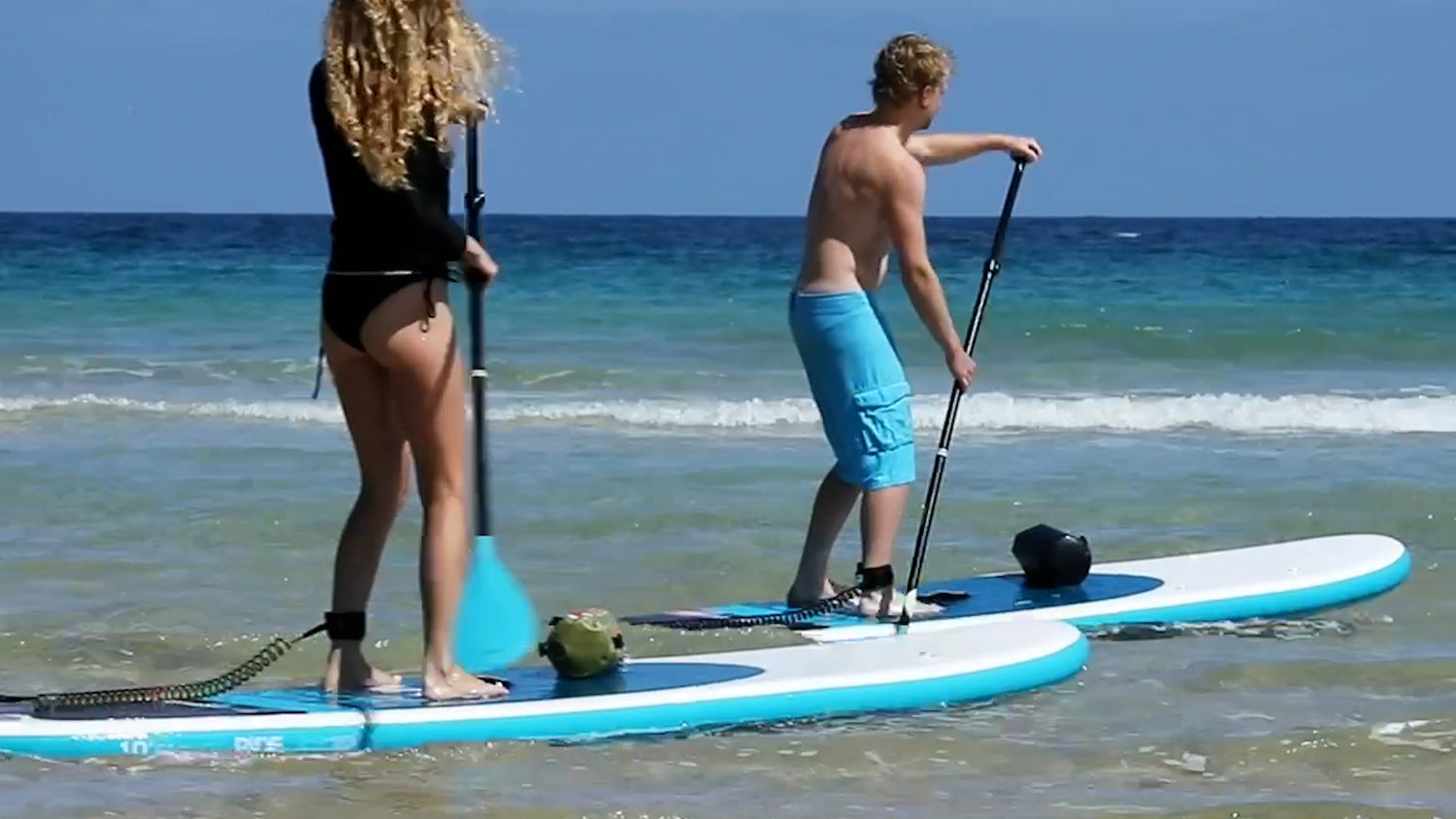 small dry bags for paddleboarding, featuring the watermelon and black small 5 litre dry bag by salty kit