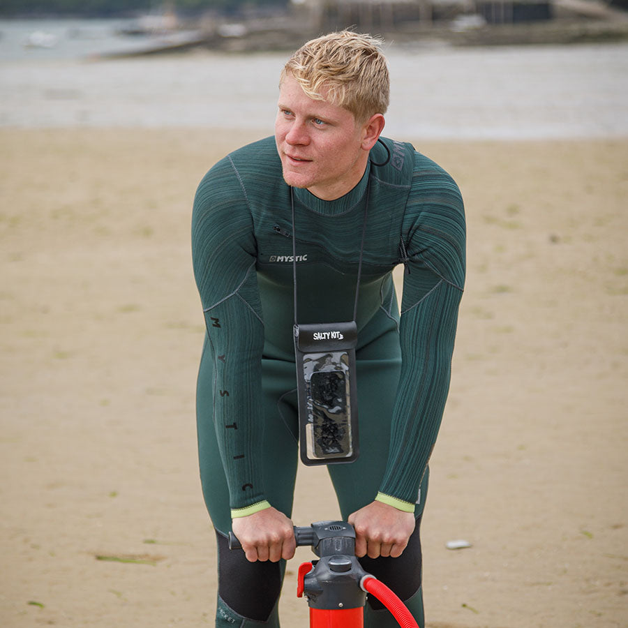 guy wearing salty kit black waterproof phone case